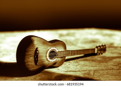 Old guitar - Powered by Shutterstock