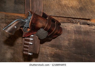 Old Gun With Sheriff  Badge