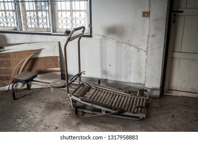 Old Gym Machine In Abandoned Room.