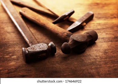 Old Hammers on a old wooden workdesk