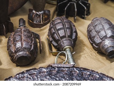 Old Hand Grenades And Other Weapons Memorabilia. Vintage Military Equipment.