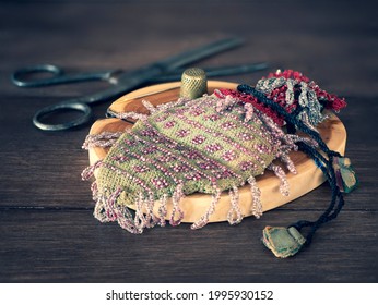 Old Handcraft Supplies For Making Beaded Hand Bag With Drawstring Ties. Concept Of Hand Making, Beading, Beadwork