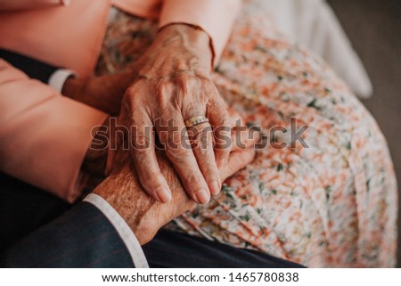Old hands cherishing eternal love