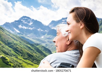 Old Happy Senior Disabled Man In Wheelchair