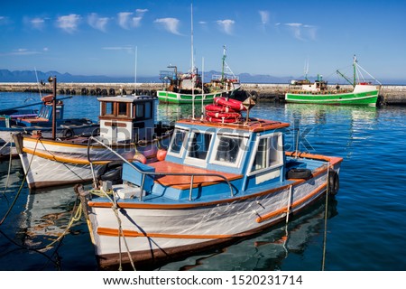 Old harbor with fishing boats in Kalk Bay, South Africa