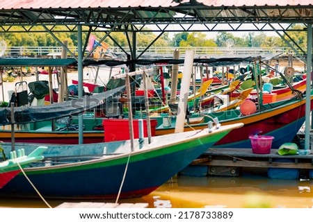 Old harbor with fishing boats in Terengganu, Malaysia.