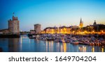Old harbor of La Rochelle, France at night
