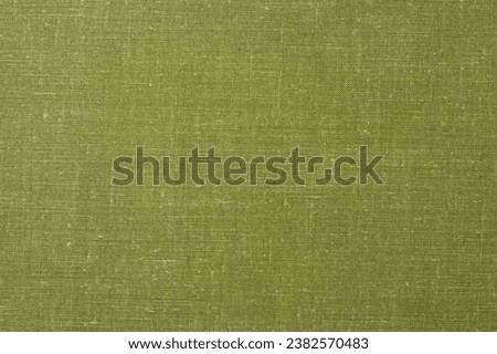 Old hard cover book texture made of green fabric