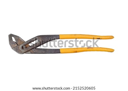 old hardware worker tools: adjustable wrench used water pump plier isolated on white background