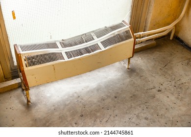 Old Heater In Dirty Corridor