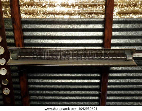 Old Heating System On Corrugated Tin Stock Photo Edit Now