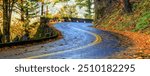 The Old highway curves through the Columbia River Gorge National Scenic Area.  Rock wall was built by the CCC, Civilian Conservation Corp, a program started by Franklin Roosevelt 