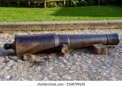 An Old Historic Cannon Barrel By The Wayside