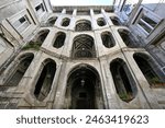 Old historic double-flight courtyard staircase in the Palazzo San Felice apartment building, Naples (Napoli), Italy