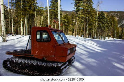 Old Historic Snow Mobile Or Snow Cat At A Ski Resort In Norther New Mexico USA Near Santa Fe And Taos Deep In The Forest With Aspen And Pine Trees Surrounding The Slope