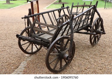 Old Historic Wooden Ox Wagon On Gravel Stone