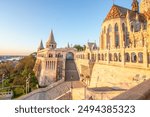 Old historical fortress and church in sunrise. City panorama at dusk. Sight on the Danube Fisherman