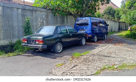 Old Holden Gemini And Suzuki Carry Parallel Parked On The Side Of The Road
Taken In Yogyakarta Indonesia At December 22nd 2020