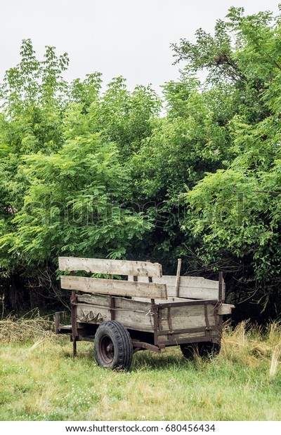 Old
homemade trailer for a car in the
countryside