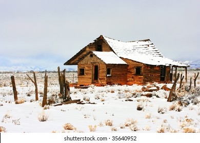 An Old Homestead On A Prairie In The Middle Of Nowhere After A Snowstorm