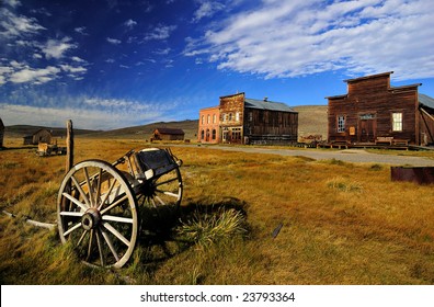 Old Horsecar And Buildings In Bodie, California