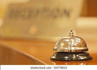 Old Hotel Bell On A Wood Stand