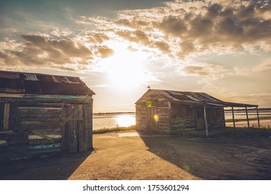 old house at the beach sunset