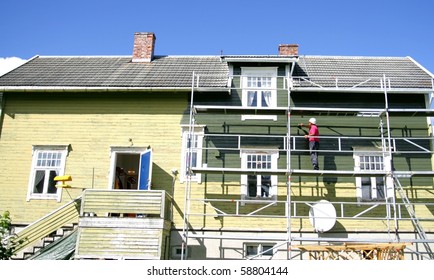 Old house being painted