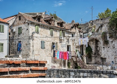 Old house with drying clothes in Split, Croatia. Architectural scene. 