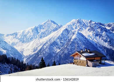 Old House At The European Alps In Winter