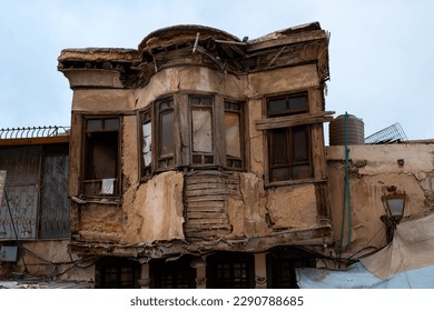 Old house, facade of a building ruin in old town of Damascus, Syria
