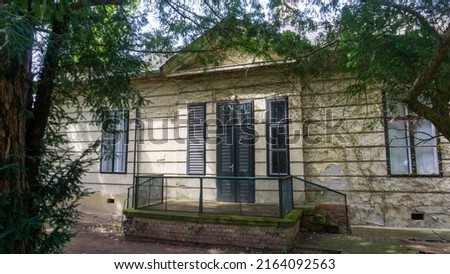 Old house in the park. Szarvas, Bekes county (Bekes megye), Hungary, May 2021. bekesstock, csabaprog Stock fotó © 