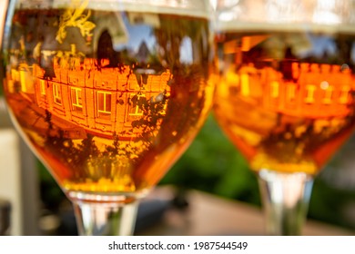 Old House Reflection In Beer Glass, Cold Beer In Hot Weather 