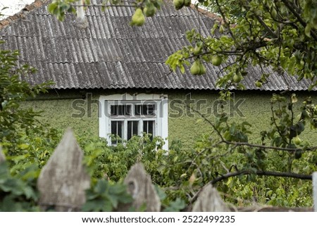 Similar – Image, Stock Photo Beautiful old slate facade with falling out shingles of slate in beige and natural colors in the old town of Detmold on the Teutoburg Forest in East Westphalia Lippe