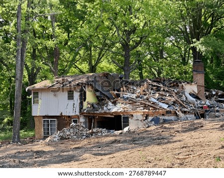 Old house structure knockdown tear down demolition for redevelopment