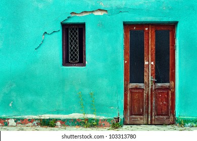 Old House Wall With Wooden Door And Window