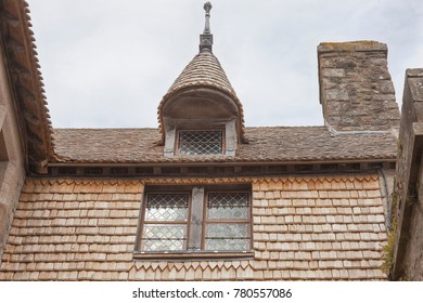 Old house with wooden shingles in the village of Mont Saint-Michel, France