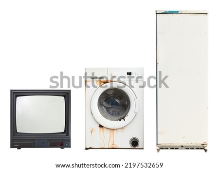Old household appliances TV, washing machine, refrigerator isolated on white background.