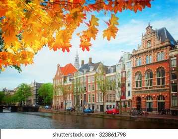 Old  Houses On Canal In Amsterdam At Fall Day, Netherlands, Retro Toned