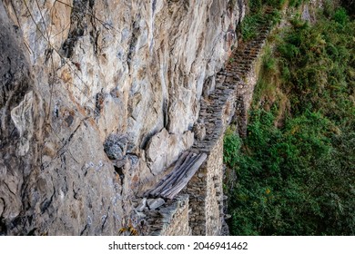 Old Inca Bridge By Cliff