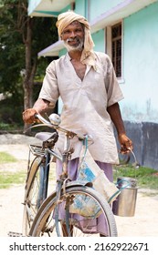 Old Indian Milk Man At His Farm