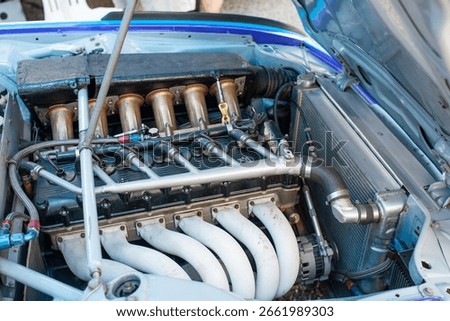 Old Inline Six Cylinder Engine with Individual Throttle Bodies