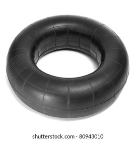 An Old Inner Tube On A White Background