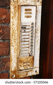 Old intercom in close up  on a brick wall