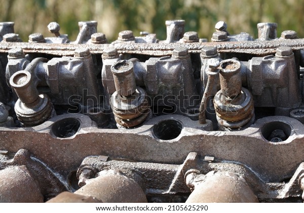 Old internal combustion engine.\
Rusty motor. Rusty iron. Technologies of the past. Car\
engine