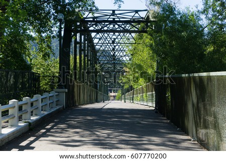 Old iron bridge over a river in Guerneville California	
