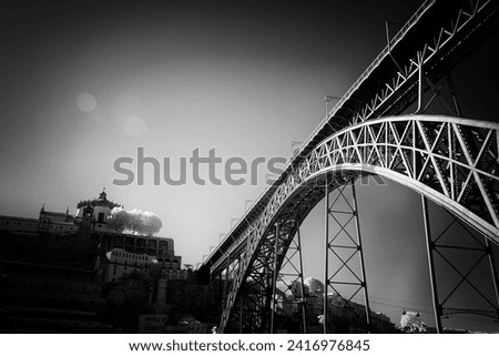 Old iron Don Luis bridge over Douro river, Porto, Portugal. Used analog infrared filter and some digital filters including noise.