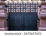 The old iron gate at the entrance to the mansion.