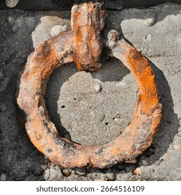 an old iron ring at a warf