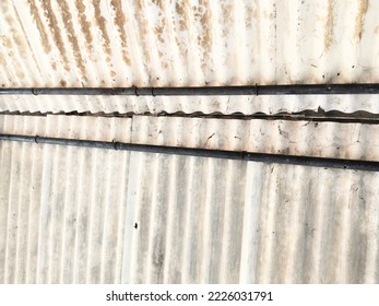 Old Iron Roof On Teakwood House. 

